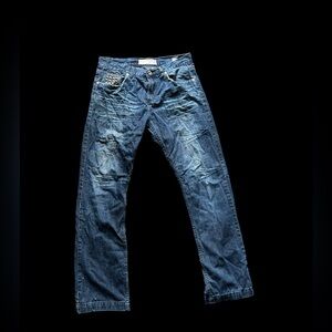 ✨Blue denim jeans with a distressed finish✨